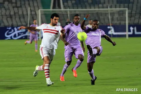 Egyptian players of al-zamalek club compete with kabuscorp sport club during their African Cup soccer match at the sports flowers club's headquarters in Cairo, capital of Egypt, on March 1, 2014. Photo by Mohammed Bendar...