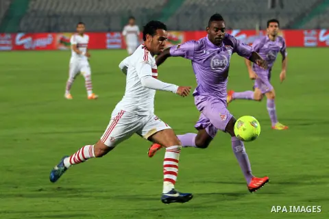 Egyptian players of al-zamalek club compete with kabuscorp sport club during their African Cup soccer match at the sports flowers club's headquarters in Cairo, capital of Egypt, on March 1, 2014. Photo by Mohammed Bendar...