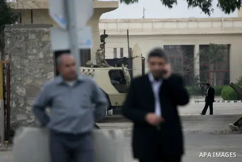 Palestinians wait to return to Gaza at the Rafah border crossing between Egypt and the southern Gaza Strip March 9, 2014. Egyptian authorities partially opened the Rafah crossing on Sunday for three days for passengers g...