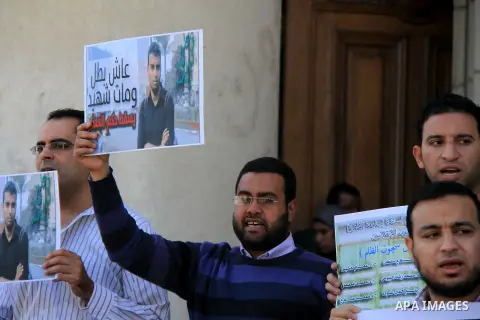 Egyptian students of the faculty of Pharmacy in the Cairo University hold placards during a demonstration calling for the release of their colleagues detained by the army-backed interim authorities, in Cairo March 10, 20...