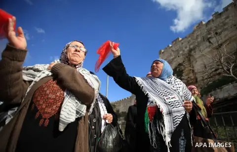 Palestinians participate in a simulated wedding marking the International Women's Day, in Jerusalem's Old City March 10, 2014. Photo by Saeed Qaq