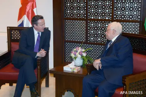 Palestinian President, Mahmoud Abbas (Abu Mazen) meets with British Prime Minister David Cameron in the West Bank city of Bethlehem on March 13, 2014. David Cameron is on his second day visit to Israeli and the Palestini...