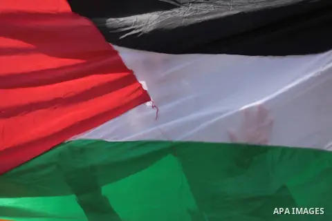 Palestinian children take part in a protest against the decision made by the United Nations Relief and Works Agency (UNRWA) to reduce food aid delivered to the Gaza Strip in front of the UNRWA headquarters in Gaza City o...