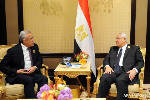A handout picture made available by the Egyptian presidency on March 25, 2014 shows Egyptian Interim president Adly Mansour (R) meeting with Lebanese President Michel Suleiman on the sidelines of the 25th Arab League sum...