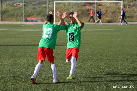Palestinian Local players play with wahdat sport club from Jordan during their match, at Jerusalem city, on March 29, 2014. Palestinian Sakhnin players win in the International Cup of Jerusalem. Photo by Saeed Qaq
