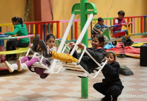 Palestinian orphans participate in a celebration to mark the Orphan Day, in Gaza city on April 03, 2014. Photo by Mohammed Asad