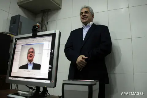 Egyptian potential presidential candidate Hamdeen Sabahi, pose for a picture at a police station to obtain the criminal status record for the candidacy to run for the upcoming elections, in al-Giza district in Cairo on A...