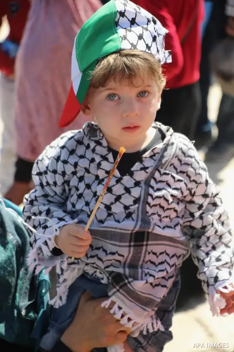 A Palestinian child takes part in a festival for Al- Aqsa child in Jerusalem, on April 05, 2014. Photo by Saeed Qaq