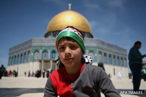 A Palestinian child takes part in a festival for Al- Aqsa child in Jerusalem, on April 05, 2014. Photo by Saeed Qaq