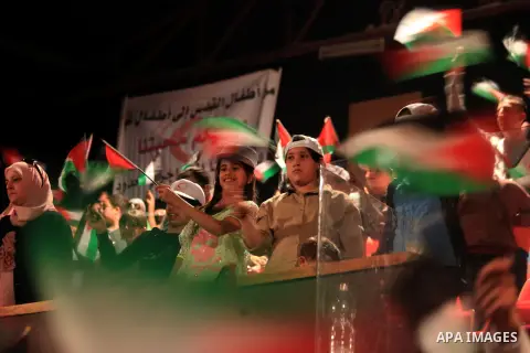 Palestinian Children take part in a festival for Children's Day, held by the Palestinian Red Crescent Society (PRCS), at the National Stage in Jerusalem, on April 05, 2014. Photo by Saeed Qaq