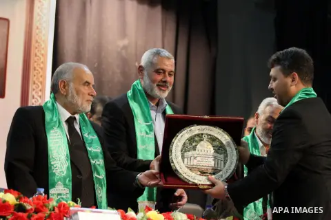 Palestinian Prime Minister in Gaza strip, Ismail Haniyeh, attends the school day during the anniversary of the departure of Sheikh Khalil Quqa in Gaza City, on April 10, 2014. Photo by Mohammed Asad