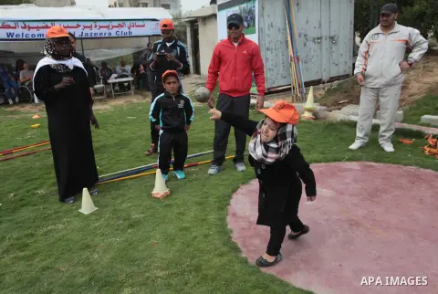 Palestinians Disabled participate in an athletics championship for disabled, at Al-Jazeera Club in Gaza city on April 19, 2014. Photo by Ashraf Amra