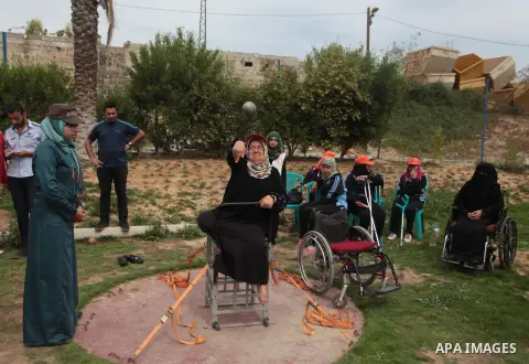 Palestinians Disabled participate in an athletics championship for disabled, at Al-Jazeera Club in Gaza city on April 19, 2014. Photo by Ashraf Amra