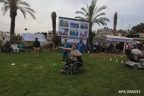 Palestinians Disabled participate in an athletics championship for disabled, at Al-Jazeera Club in Gaza city on April 19, 2014. Photo by Ashraf Amra