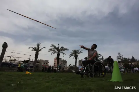 Palestinians Disabled participate in an athletics championship for disabled, at Al-Jazeera Club in Gaza city on April 19, 2014. Photo by Ashraf Amra