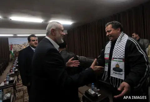 Palestinian Prime Minister in Gaza Strip, Ismail Haniyeh meets with the aid convoy of "Miles of Smiles 26" at his office in Gaza city April 20, 2014. Photo by Ashraf Amra