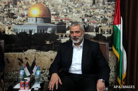 Palestinian Prime Minister in Gaza Strip, Ismail Haniyeh meets with the aid convoy of "Miles of Smiles 26" at his office in Gaza city April 20, 2014. Photo by Ashraf Amra