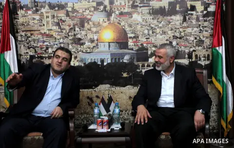 Palestinian Prime Minister in Gaza Strip, Ismail Haniyeh meets with the aid convoy of "Miles of Smiles 26" at his office in Gaza city April 20, 2014. Photo by Ashraf Amra