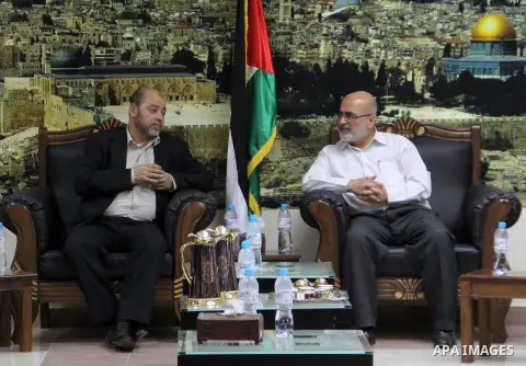 Palestinian Hamas leader Mousa Abu Marzouk arrives at the Rafah crossing border, in the southern Gaza Strip, April 21, 2014. Photo by Eyad Al Baba
