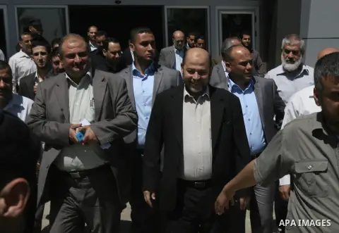Palestinian Hamas leader Mousa Abu Marzouk arrives at the Rafah crossing border, in the southern Gaza Strip, April 21, 2014. Photo by Eyad Al Baba