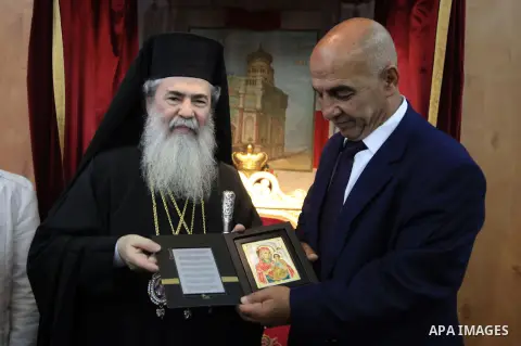 Palestinian Security Forces Spokesman, Major General Adnan Al-Damiri, visits the Church of the Resurrection during a visit to Jerusalem's old city on April 23, 2014. Photo by Saeed Qaq
