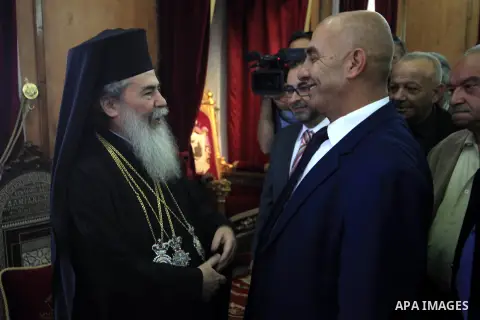 Palestinian Security Forces Spokesman, Major General Adnan Al-Damiri, visits the Church of the Resurrection during a visit to Jerusalem's old city on April 23, 2014. Photo by Saeed Qaq