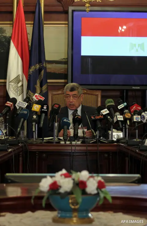Egyptian Interior Minister Mohamed Ibrahim, speaks during a press conference, in Cairo on May 12, 2014. Ibrahim announced that Egyptian security forces arrest 40 terrorist cell and 225 defendants implicated in the attack...