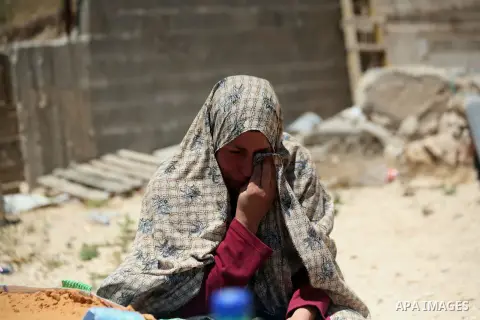 A Palestinian woman reacts after demolish her house by Israeli municipality bulldozers under the pretext of building without permit, at Jabal al-Mukaber district, East Jerusalem May 14, 2014. Israel destroyed more than 5...