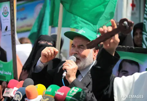 The spokesman of the Palestinian Parliament in Gaza Strip, Ahmed Bahar speaks during a rally in Gaza City on May 17, 2014 to express solidarity with Palestinian prisoners on hunger strike in Israeli jails. In late March,...