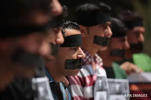 Palestinian youths take part a protest to solidarity with Palestinian prisoners on hunger strike in Israeli jails in Gaza City on May 19, 2014. Israel had refused to release as promised a last group of Palestinian prison...