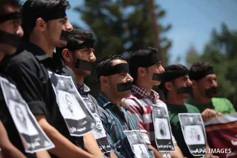Palestinian youths take part a protest to solidarity with Palestinian prisoners on hunger strike in Israeli jails in Gaza City on May 19, 2014. Israel had refused to release as promised a last group of Palestinian prison...
