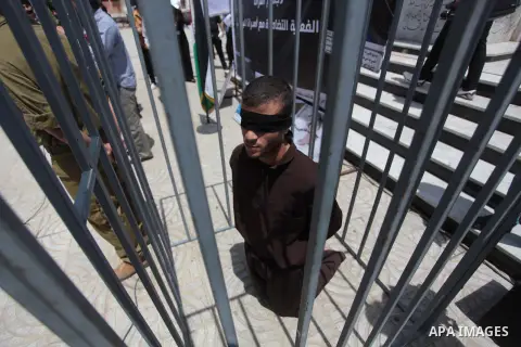 Palestinian youths take part a protest to solidarity with Palestinian prisoners on hunger strike in Israeli jails in Gaza City on May 19, 2014. Israel had refused to release as promised a last group of Palestinian prison...