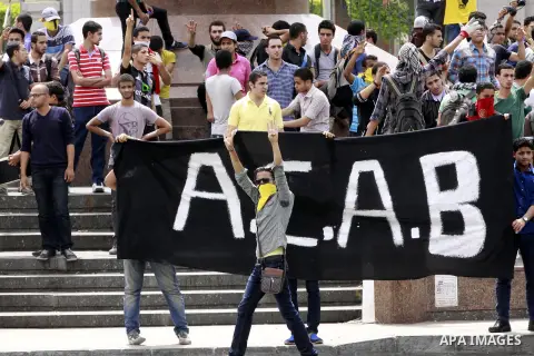 Egyptian supporters of ousted President Mohammed Morsi chant slogans during a demonstration outside Cairo University in Giza, near Cairo, May 20, 2014. Students who took their protest outside the campus Wednesday clashed...
