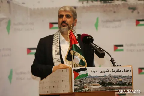 Palestinian political leader of the Hamas movement, Khaled Meshaal, speaks during a ceremony to mark "Nakba", the annual commemoration of what Palestinians term the catastrophe in Doha, Qatar, May 20, 2014. Meshaal said...