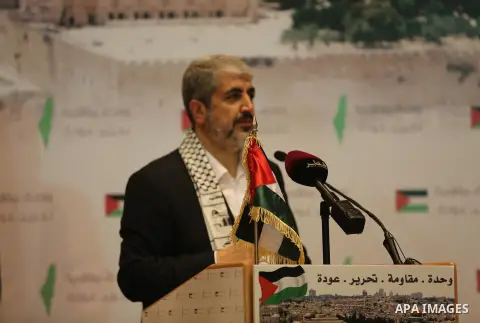 Palestinian political leader of the Hamas movement, Khaled Meshaal, speaks during a ceremony to mark "Nakba", the annual commemoration of what Palestinians term the catastrophe in Doha, Qatar, May 20, 2014. Meshaal said...