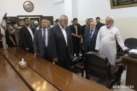 Palestinian Prime Minister in Gaza, Ismail Haniyeh attends the opening of the headquarters of the Palestine Scholars Association in Gaza City, in May 22, 2014. Photo by Mohammed Asad