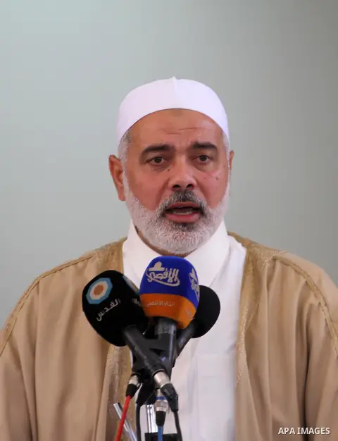 Palestinian Prime Minister in Gaza Strip Ismail Haniyeh gives a speech during Friday prayer at Bilal Bin Rabah mosque, in Gaza City on May 23, 2014. Photo by Mohammed Asad