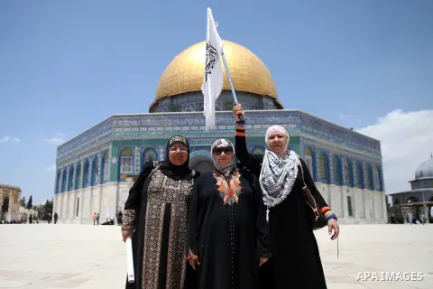 Palestinians take part in a protest to express solidarity with Palestinian prisoners on hunger strike in Israeli jails, following Friday prayer at al-Aqsa mosque compound, in Jerusalem's Old City on May 23, 2014. In late...