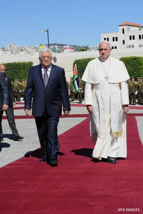 Pope Francis and Palestinian President Mahmud Abbas attend a welcome ceremony on May 25, 2014 in the West Bank Biblical town of Bethlehem. Pope Francis arrived in Bethlehem to begin the most sensitive part of his three-d...