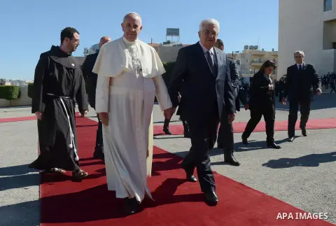 Pope Francis and Palestinian President Mahmud Abbas attend a welcome ceremony on May 25, 2014 in the West Bank Biblical town of Bethlehem. Pope Francis arrived in Bethlehem to begin the most sensitive part of his three-d...