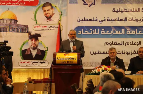 Palestinian prime minister in Gaza strip, Ismail Haniyeh attends a conference of the Islamic radios union, in Gaza city, on May 25, 2014. Photo by Mohammed Asad
