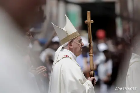 Pope Francis attends an open-air mass in the Manger Square, next to the Nativity Church in the West Bank town of Bethlehem May 25, 2014. Pope Francis made an impassioned plea for peace on a pilgrimage on Sunday to Bethle...
