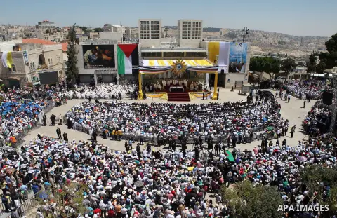 Pope Francis celebrates an open-air mass in the Manger Square, next the Nativity Church, in the West Bank city of Bethlehem, 25 May 2014. Pope Francis arrived in the West Bank to start the most delicate part of his stay...