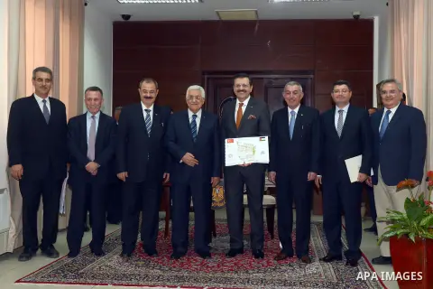 Palestinian President Mahmoud Abbas attends the signing ceremony of create the Jenin industrial area in the West Bank city of Ramallah May 27, 2014. Photo by Thaer Ganaim