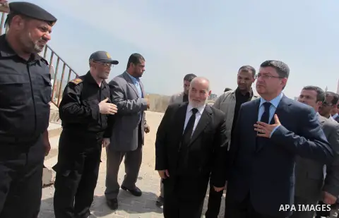 Turkish ambassador in Palestine Mustafa Sarnic and deputy President of the Palestinian Legislative Council Ahmed Bahr take part in a rally ahead of the 4th anniversary of the Mavi Marmara Gaza flotilla incident, at the s...