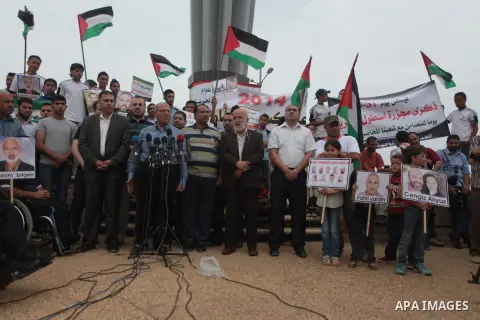 Palestinians take part a rally on the fourth anniversary of the Mavi Marmara Gaza flotilla incident, at the seaport of Gaza City May 31, 2014. Eight Turks and a Turkish-American, died in an Israeli commando raid on the M...