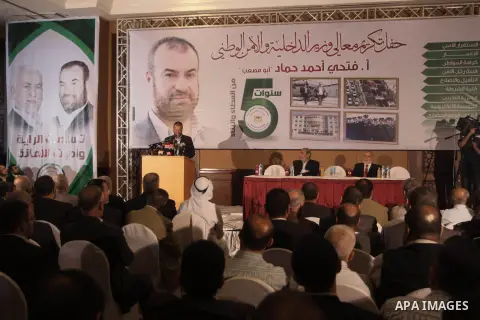 Former Palestinian minister of Interior affairs in Gaza Strip Fathi Hammad, attends his honoring ceremony, in Gaza City on June 02, 2014. President Mahmoud Abbas swore in a Palestinian unity government on Monday under a...