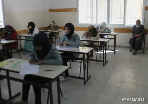 Palestinian female students during the first day of the high school exams (Tawjihe), in the West Bank city of Nablus, 07 June 2014. More than 85,000 high school students from the West Bank, including East Jerusalem, and...
