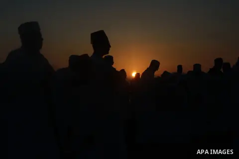 Members of the Samaritan community pray atop Mount Gerizim, above the city of Nablus, West Bank, after sunrise on 08 June 2013, as they celebrate the Shavuot festival, marking the giving of the Torah at Mount Sinai seven...