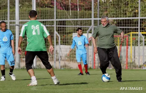 Senior leader of Hamas Ismail Haniyeh participates in football match in solidarity with prisoners on hunger strike held in Israeli jails in Gaza city, on June 7, 2014. Some 120 Palestinians jailed without trial in Israel...